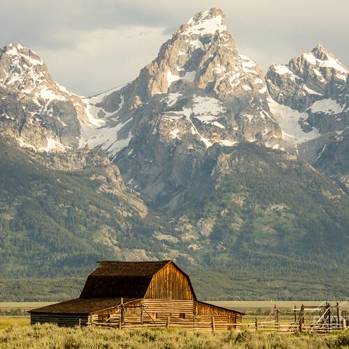 Historic barn with the Teton Mountains in Grand Teton National Park, Wyoming.